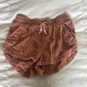 Coral/beige Billabong shorts with tie in front and 2 pockets